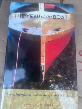 The Year of the Boat – Red & Black Boat Cover Photo